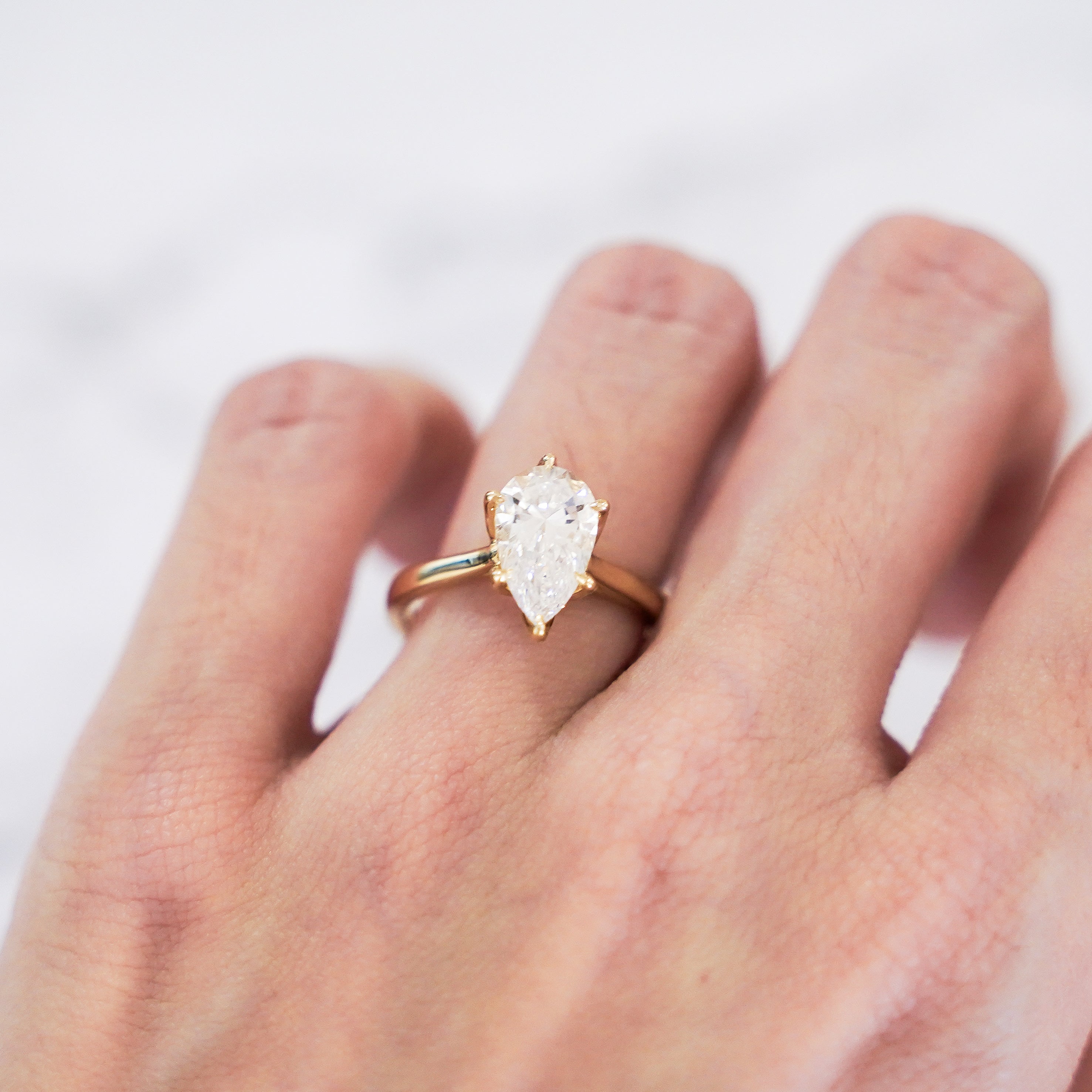 2 Carat Pear Cut Tulip Dome Solitaire Ring in 14K Yellow Gold