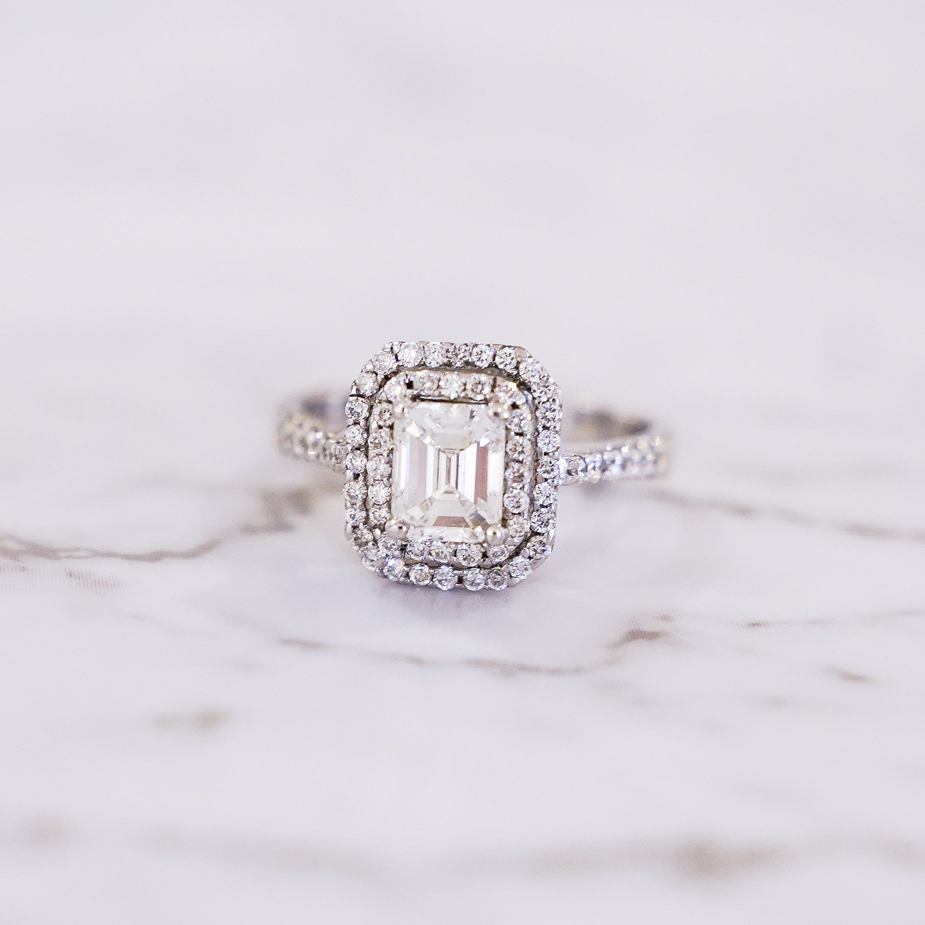 1.47 Carat Emerald Cut Double Halo Pavé Diamond Ring in 18K White Gold