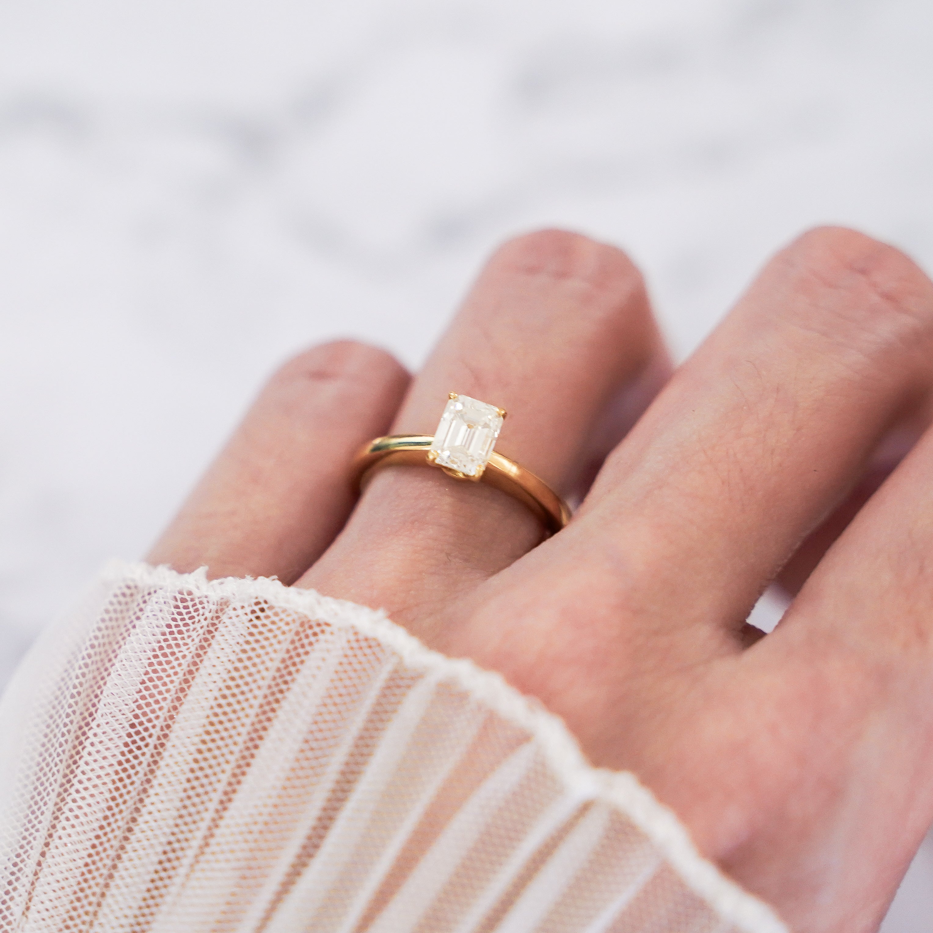 1 Carat Emerald Cut Solitaire Ring in 14K White Gold