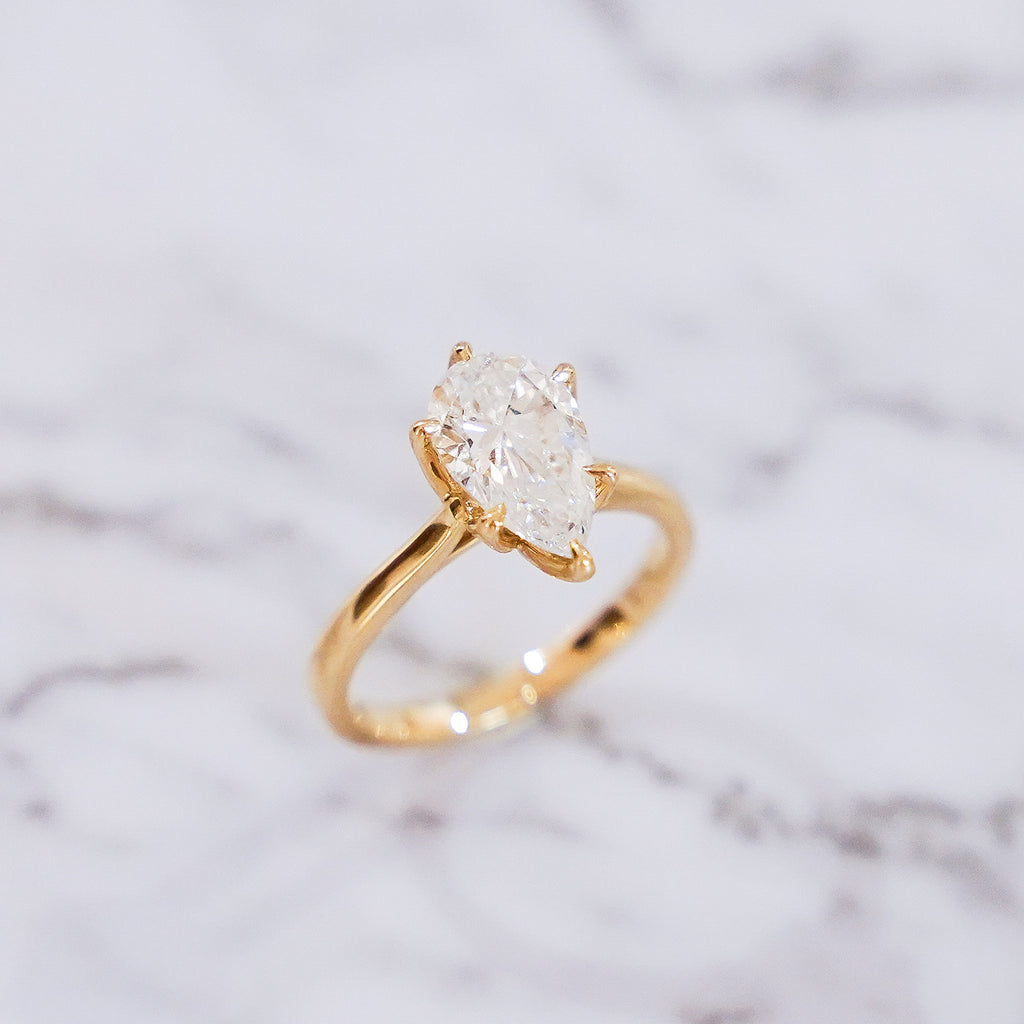 2 Carat Pear Cut Tulip Dome Solitaire Ring in 14K Yellow Gold