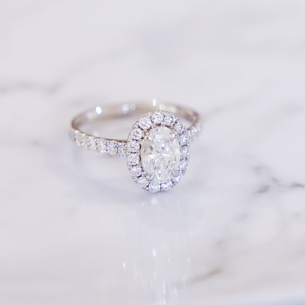 1 Carat Oval Cut Pavé Halo And Shank Diamond Ring In 14K White Gold