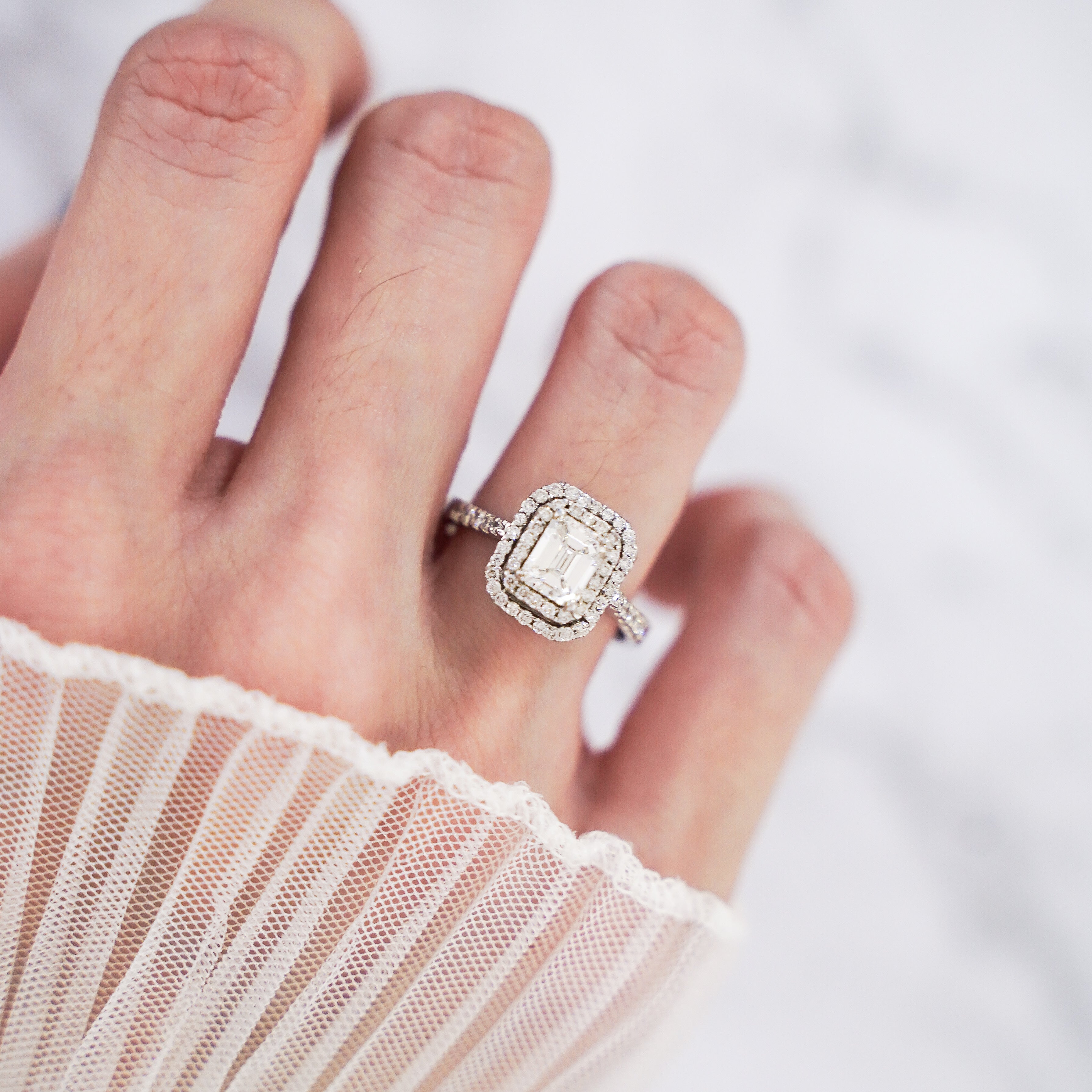 1.47 Carat Emerald Cut Double Halo Pavé Diamond Ring in 18K White Gold