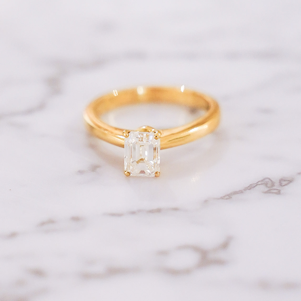 1 Carat Emerald Cut Solitaire Ring in 14K White Gold