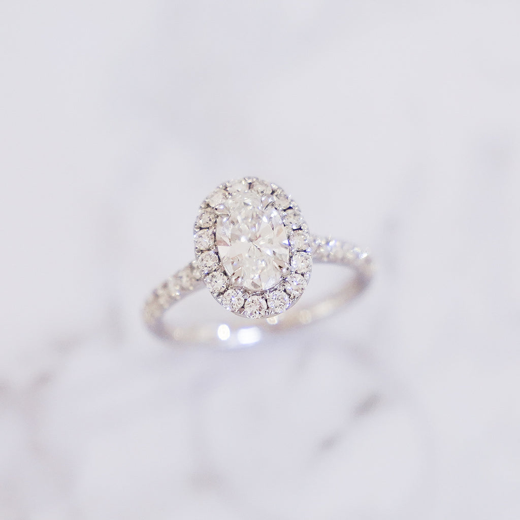1 Carat Oval Cut Pavé Halo And Shank Diamond Ring In 14K White Gold