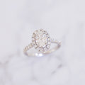 1 Carat Oval Cut Pavé Halo And Shank Diamond Ring In 14K White Gold