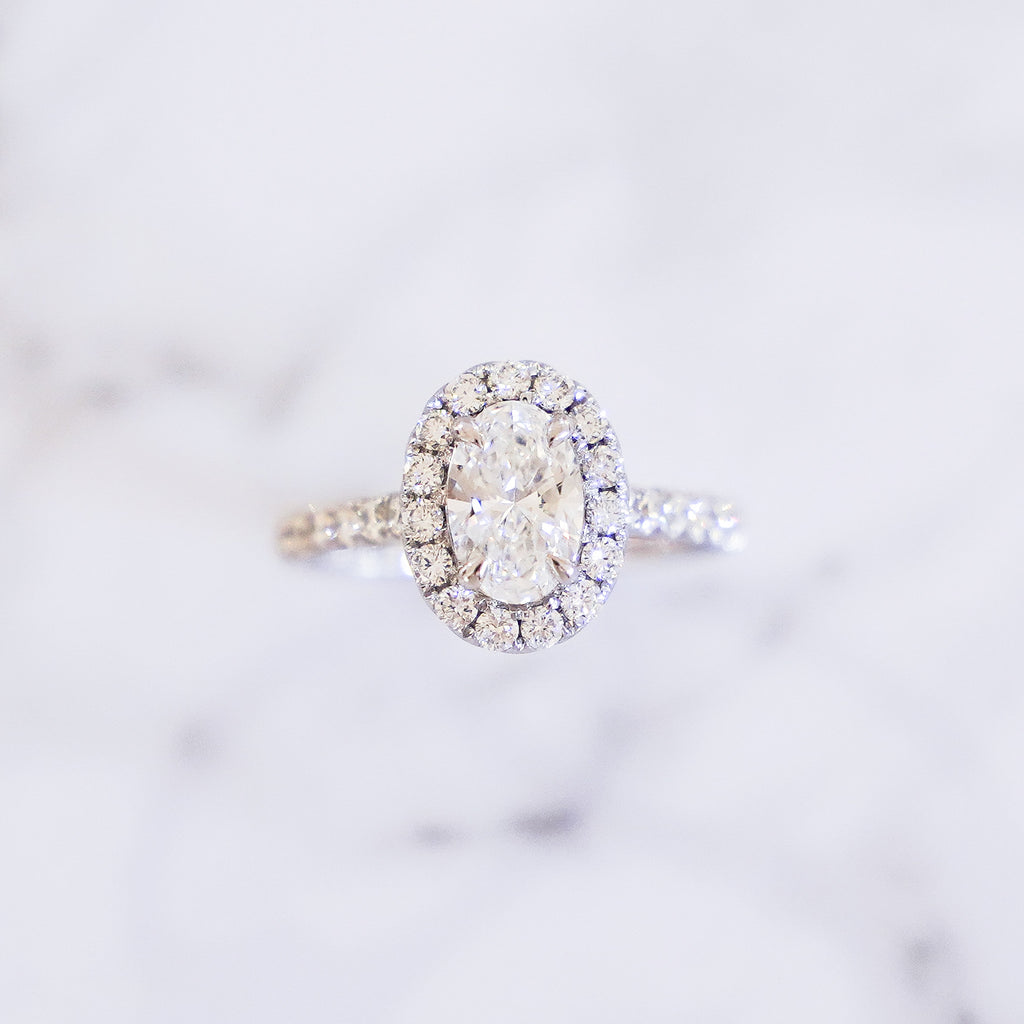 1 Carat Oval Cut Pavé Halo And Shank Diamond Ring In 14K White Gold