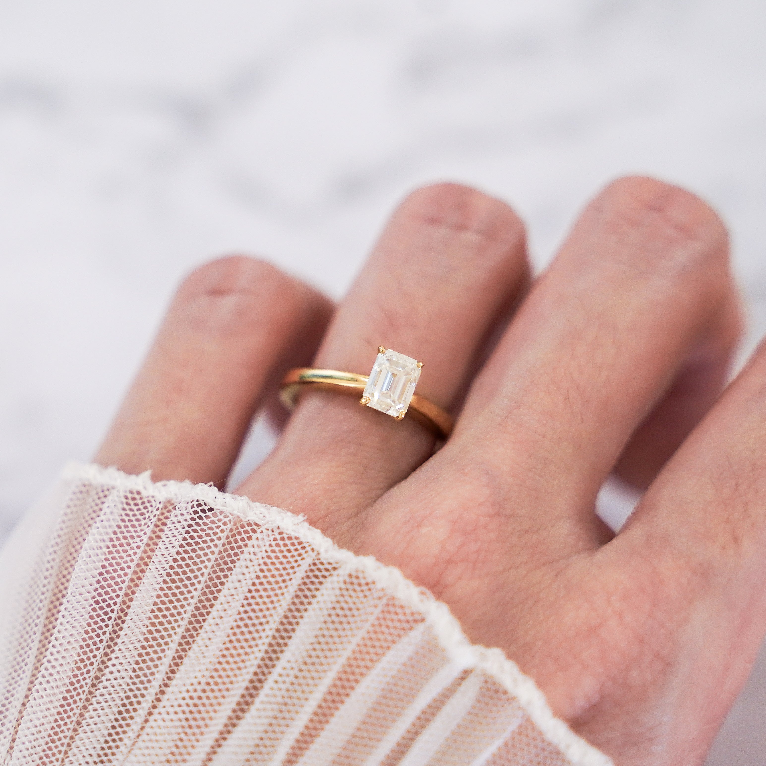 1 Carat Emerald Cut Solitaire Ring in 14K White Gold
