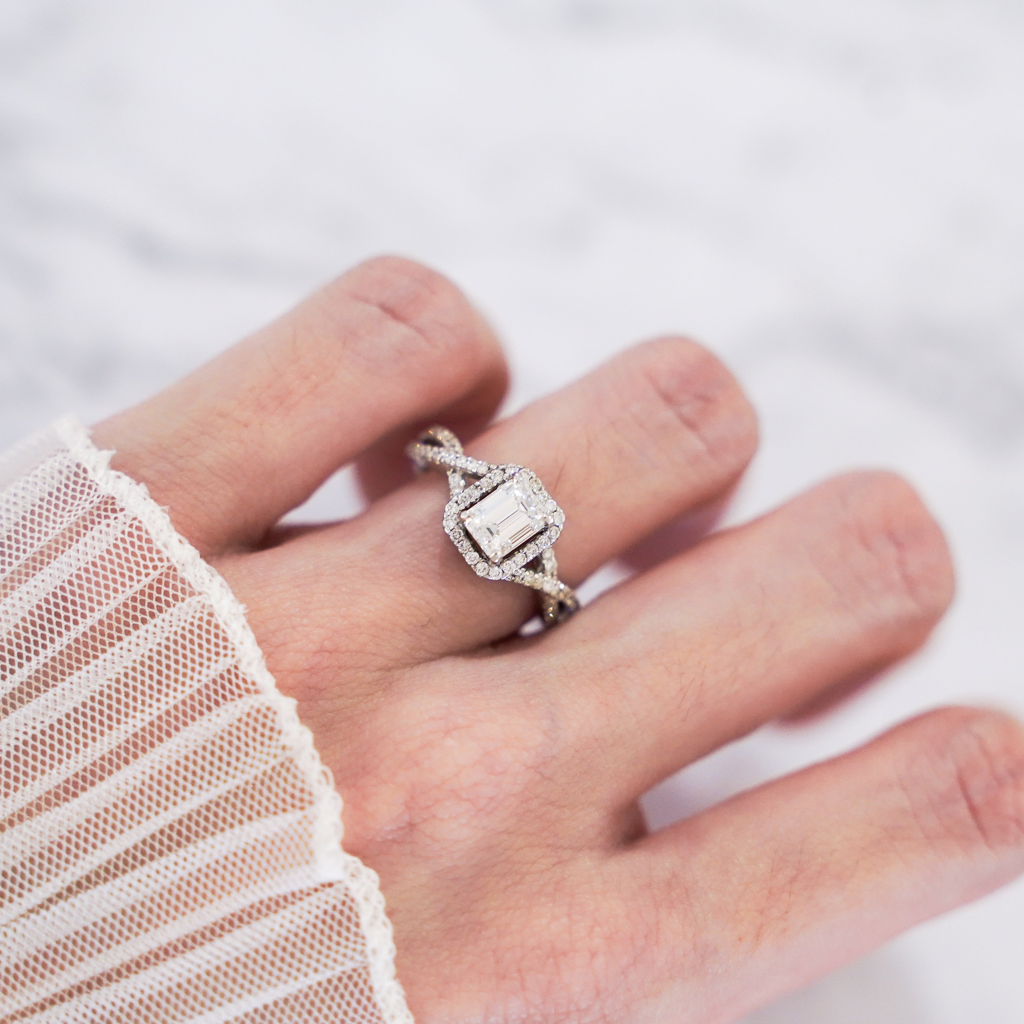 1.36 Carat Emerald Cut Halo Diamond Ring with Pavé Infinity Band in 18K White Gold